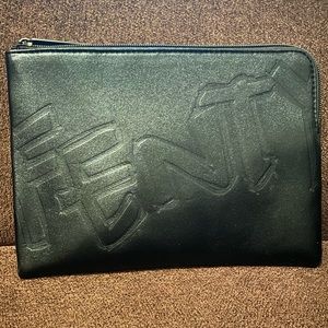 BRAND NEW FENTY Cosmetic case 6.5”H x 9”W. Neoprene material. Black color.
